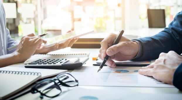 Staff members working to offer debt collection and recovery services